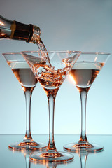 Martini being poured into a glass