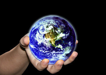 our world earth in childs hand