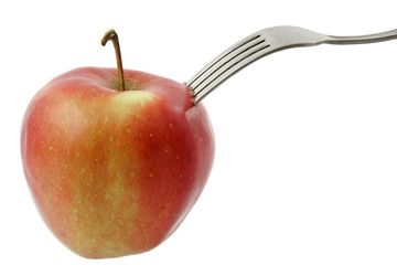 Fork dig into apple