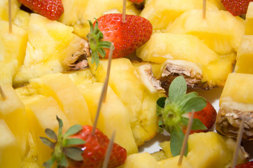 healthy fresh friut salad from ananas and strawberry