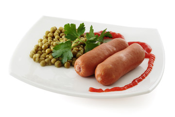 Two sausages with canned green peas