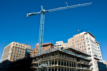 Fototapeta na wymiar active construction site with crane