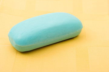 Soap on yellow towel