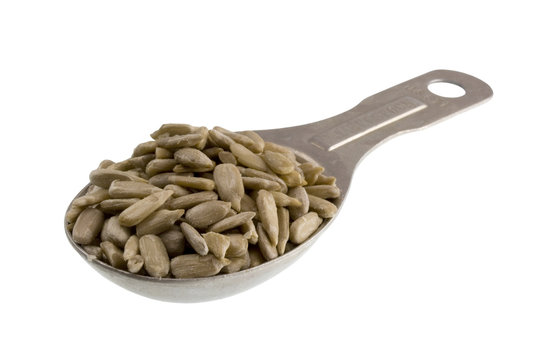 measuring tablespoon of sunflower seeds