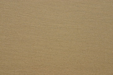 Closeup of sand at the beach. Suitable for background use