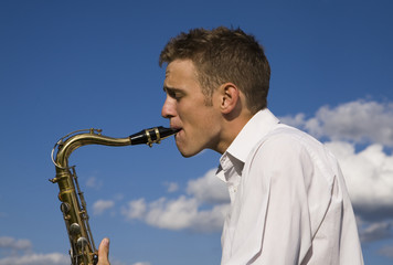 Young man playing saxophone