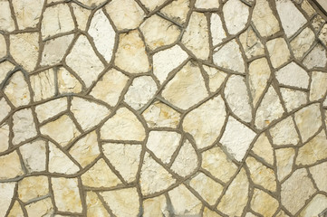 Wall of white rough stones