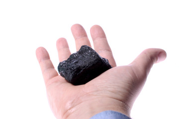 Pieces of coal in palm/ Holding Coal