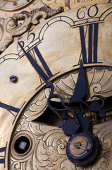 Old clock showing five to twelve