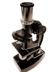 Microscope over white background