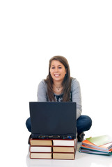 Teen student working on laptop