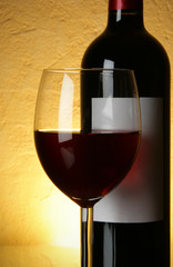 Glass and bottle of red wine