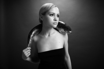 Fototapeta premium fashionable girl with big fish