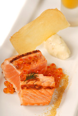 Seared Asian salmon with caviar and pumpkin soup