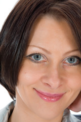 Naklejka premium portrait of the brunette with blue eye on