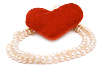 Obraz premium beads and red heart isolated on white