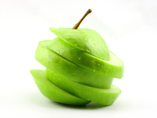 The sliced green apple
