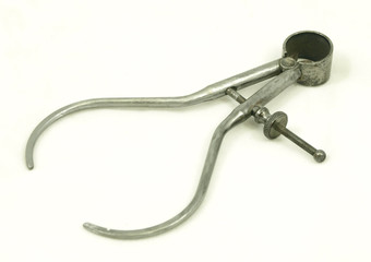 Isolated photo of a pair of wood measuring calipers