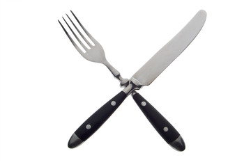 fork and knife crossed on white background