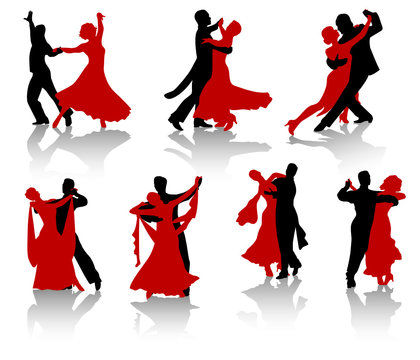 Silhouettes of the pairs dancing ballroom dances. 