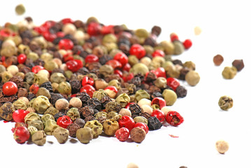 Mixed pepper on white background 