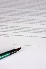 a pen on a contract