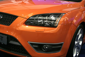 Obraz na płótnie Canvas Orange car front panel