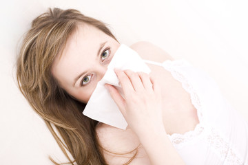 Woman with tissue.
