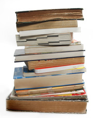 A stack of old vintage and modern books