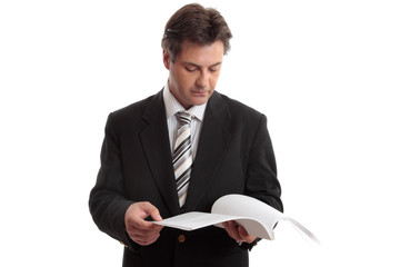 Businessman reading report or document