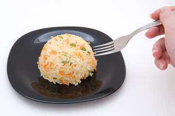 risotto on a black plate