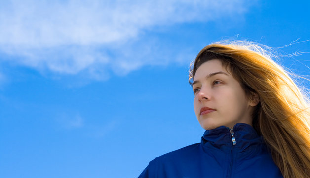 Confident serious young woman looking forward