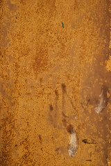 Detail of rusty metal surface with scratches