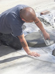 Man doing cement work