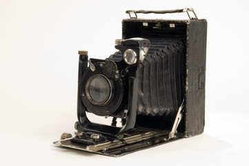 Old classical camera with furs.