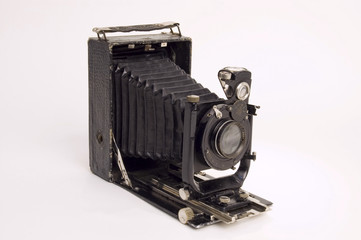Old classical camera with furs.
