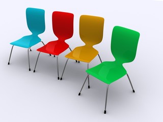 A group of colourful modern design office chairs.