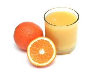 Glass of orange juice and segment of an orange