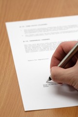 Signing contract closeup