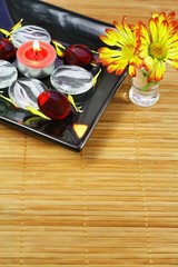 Still life with candle and color of glass