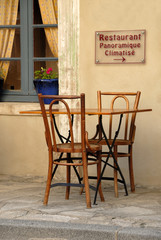 Sidewalk cafe table in France