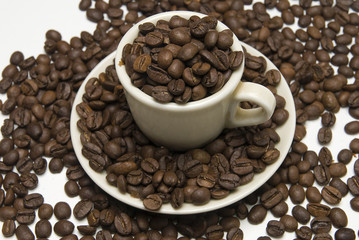 Coffee cup with bins of coffe