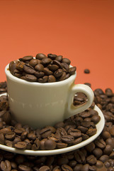 Coffee cup with bins of coffe