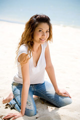 Fototapeta na wymiar happy asian woman by the beach