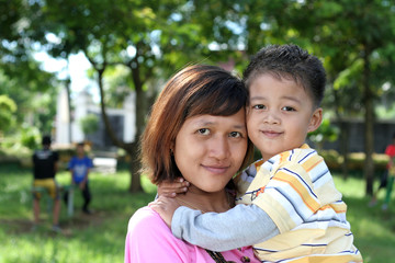 asian mother and son at garden