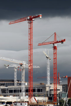 Tower Cranes and stormy sky construction zone