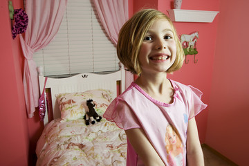 Little girl in her pink room