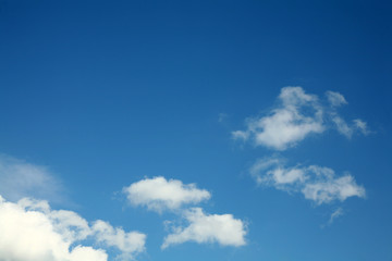 Naklejka na ściany i meble Clouds on blue sky