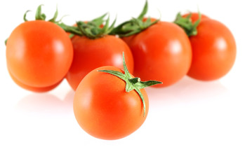 fresh juicy small tomato with a few