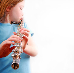 Young Girl Playing Flute